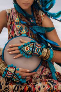 attractive young woman in ethnic jewelry close up portrait Vergebungsritual Ho'oponopono